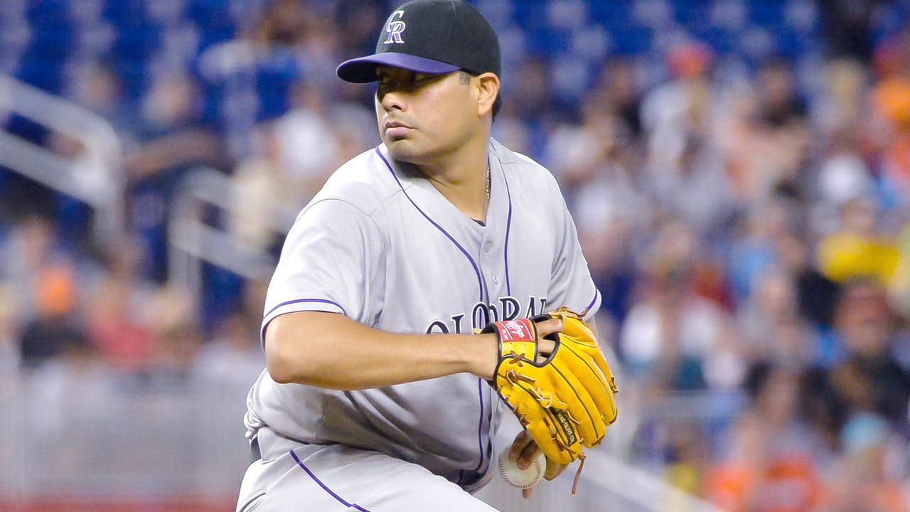 Jorge De La Rosa sets Rockies' win record by beating Marlins